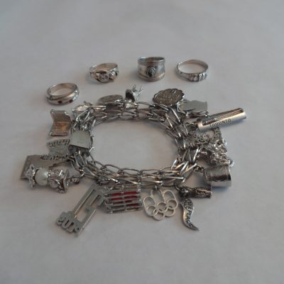 Sterling charm bracelet and rings