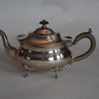 Sterling silver teapot with wooden handle