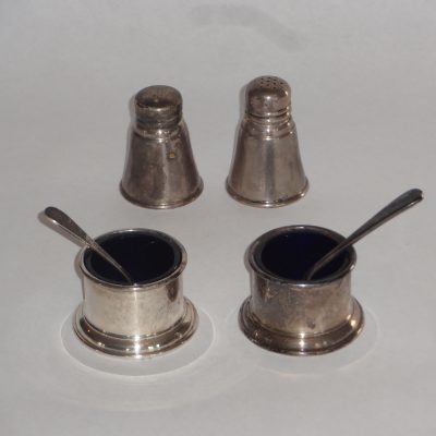 Set of four sterling salts, two with glass inserts and spoons