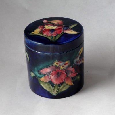 Moorcroft covered dish/humidor in orchid design.