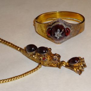 Gold serpent necklace, and bangle bracelet