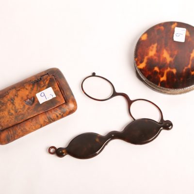 9. Ladies’ powder case.  Tortoise  shell and silver case.  With   similiar folding glasses. And  snuff box.  Burled walnut with  hinged lid.  Probably English.   Late 19th century.