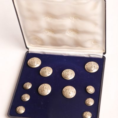 6A. Military button set.  With the  Royal Crown indicating it was  made for the Nobleman Baron  van ASCH van WYCK. Early 20th  century.  In  original box. 