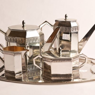 63   Art Deco tea set.  Silver       plated Including: Tea pot;  coffee pot; cream and sugar;  and tray
