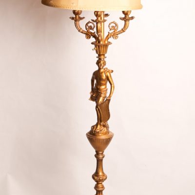 17   Figural floor lamp.  Spelter     metal with gilt finish in  female motif.  With original  silk shade in butterfly motif.   Early 20th century.