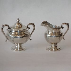 48A. Sterling silver cream and sugar. Both handled. Birks Co. Early 20th century.