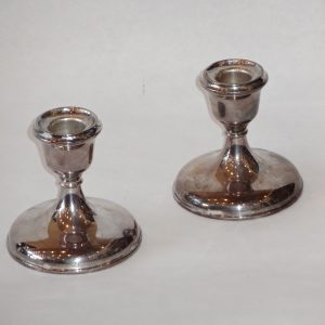 58.  Sterling silver low candlesticks. English made. Early 20th century.