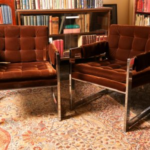 49. Stainless steel open armchairs.  Mid-century style with brown velour upholstery. Two pieces.  