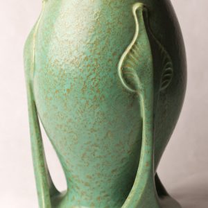74. Art pottery vase. Art nouveau style.  Hand made in mottled green.  Possibly American.  11" H. Early 20th century.  
