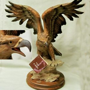 30. Giuseppi Armani wooden sculpture. Golden eagle. 17" h.  